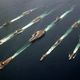 Illustration for article titled This Photo Of Battle Group Echo From 1987 Defines The Reagan Era U.S. Navy